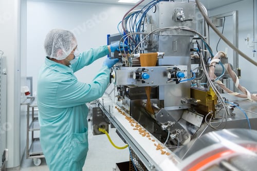Preview: Pharmacy industry factory man worker in protective clothing in sterile working conditions