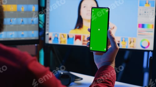Preview: Photo editor following guide on green screen smartphone about using retouching software