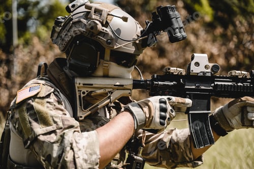 Preview: Soldier in protective combat uniform, Soldier with rifle in forest