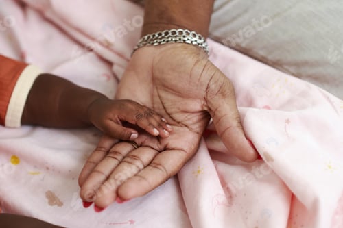 Preview: Mother Holding Hand of Baby