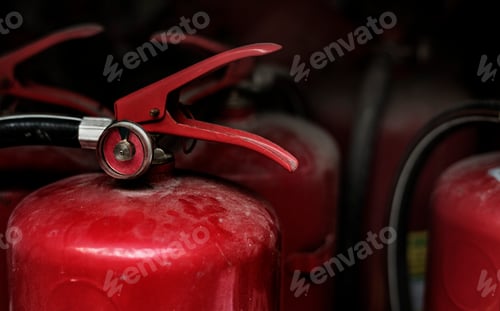Preview: Closeup of red fire extinguishers