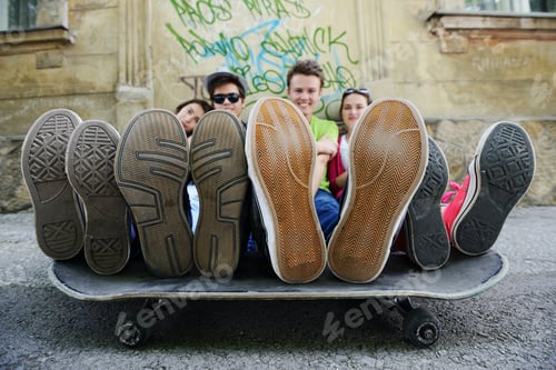 Preview: Urban Stylish Trendy Young Teenage People With Legs On Skate