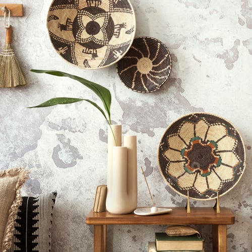 Preview: Warm and cozy composition of ethnic living room interior with design colorful baskets