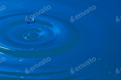 Preview: Splash of colorful liquid with high speed flash
