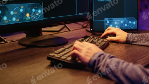 Preview: Hacker typing malware code on keyboard