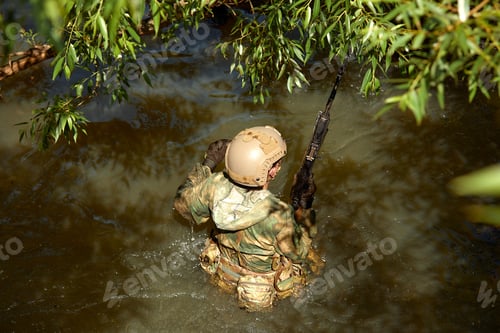 Preview: Full military experience - One day commando - running through the water with automatic rifle replica