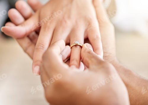 Preview: Closeup hand of proposal engagement ring after romantic, caring and loving man proposes to woman. B
