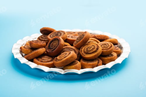 Preview: Indian Fried Bhakarwadi Tea Time Snack also known as bakarwadi, bakarvadi, bakar vadi or spring roll