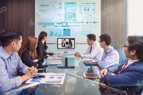 Preview: Group of asian Business team having video conference with their manager