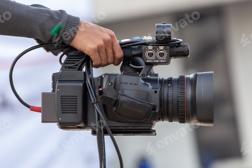 Preview: Close up Professional videographer on event, videographer filmmaker cinematographer camera.