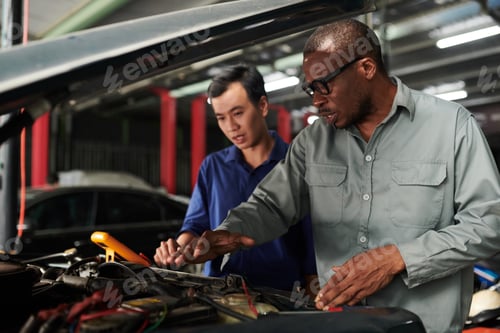 Preview: Mechanic Using Multimeter