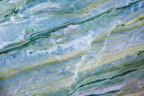 Preview: Natural blue and green polished stone surface with detailed abstract vein texture background closeup