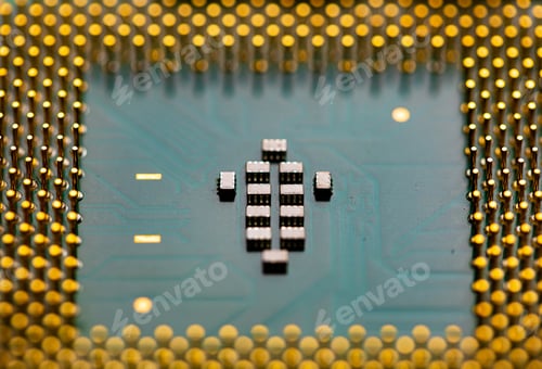 Preview: Close up of microchips and pins on Main CPU PC processor circuit board.