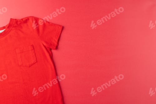 Preview: Vibrant Red T-Shirt with Pocket on Red Background