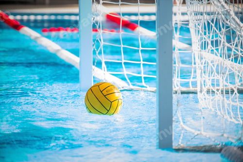 Preview: Yellow water polo ball in the pool