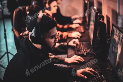 Preview: Teenagers are playing videogames at internet club