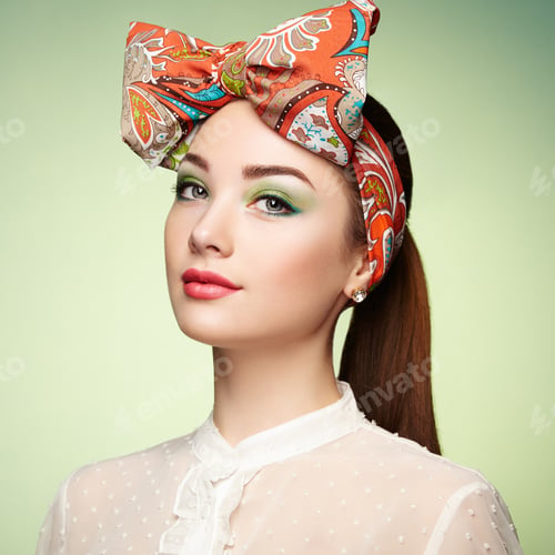 Preview: Portrait of beautiful young woman with bow