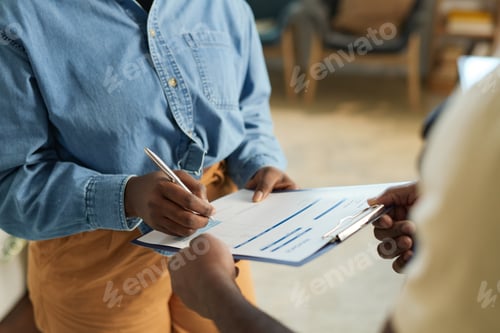 Preview: Woman Signing Contract Closeup
