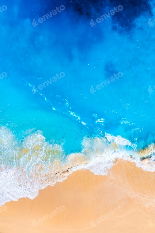 Preview: Waves and beach from a drone. Aerial landscape. Blue water background from drone.