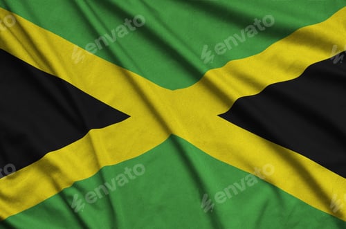 Preview: Jamaica flag is depicted on a sports cloth fabric with many folds. Sport team waving banner