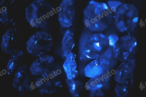 Preview: Close-up of shining crystals in chain