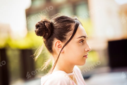 Preview: Charming teenage girl with hair bus on street