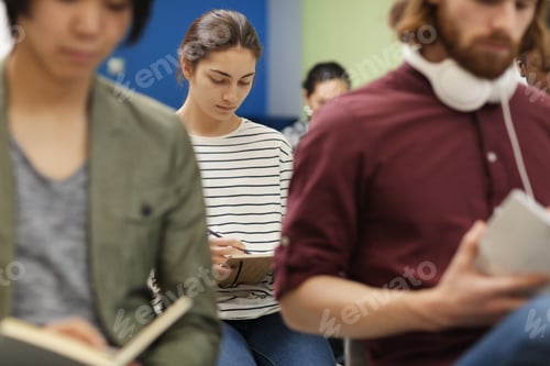 Preview: People doing writing task