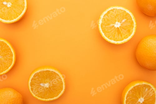 Preview: top view of juicy whole oranges and slices on colorful background