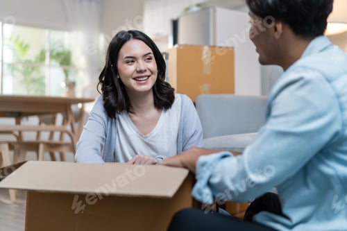Preview: Asian young happy new marriage couple moving to new house together.