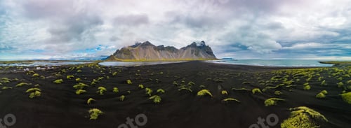 Preview: Vestrahorn mountain with black sand beach and Viking village, Iceland.