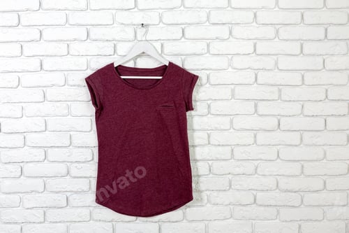 Preview: Maroon T-Shirt Hanging on Wall Inside Home
