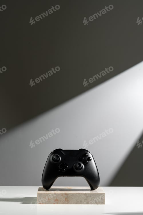 Preview: Joystick on sunlight against gray background close up