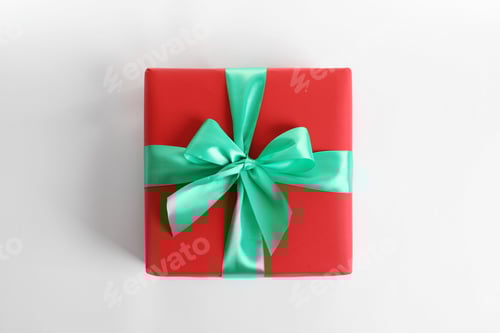 Preview: Beautifully wrapped gift box on white background, top view
