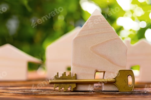 Preview: Wooden toy house and house keys close up