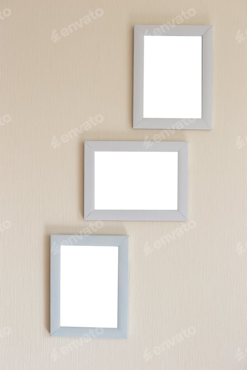 Preview: Collage of three white frames on a beige wall