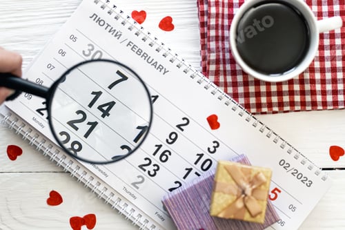 Preview: Valentine's Day background, date February 14 on calendar, flat lay, top view.