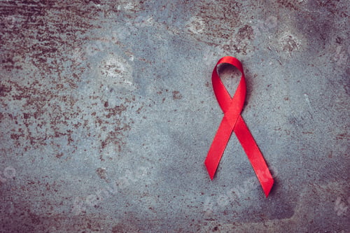Preview: Red ribbon symbol of human immunodeficiency virus disease. dark background. aids concept
