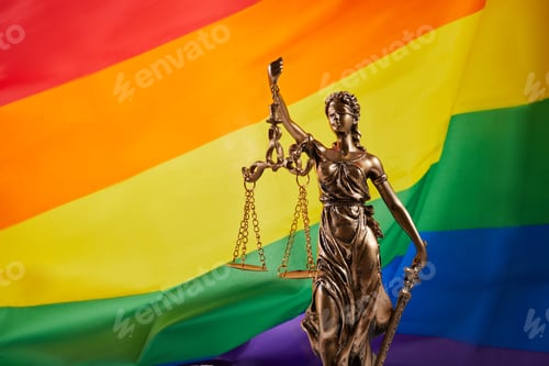 Preview: The blindfolded goddess of justice Themis against the rainbow flag of LGBT. LGBT rights and law.