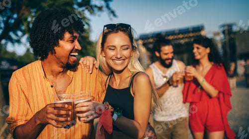 Preview: Group of friends having fun time at music festival