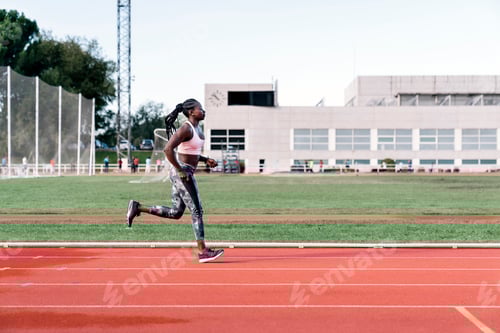Preview: Athlete woman sprinter running in track
