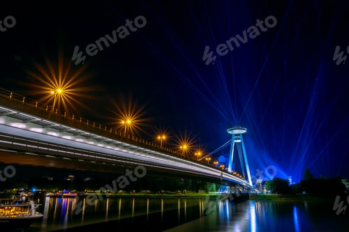Preview: Lights and traffic on a bridge illuminate the night