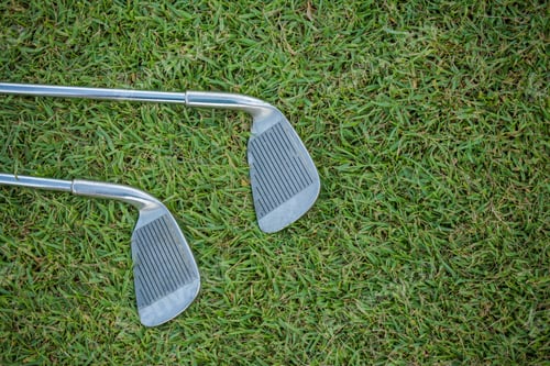 Preview: Golf Club And Ball In Grass