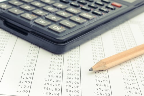 Preview: Calculator and pencil on spreadsheet. Business concept