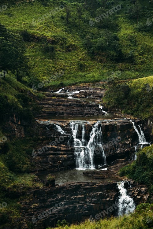 Preview: Waterfall among the green mountains. Waterfalls Of Sri Lanka. Landscapes Of Asia