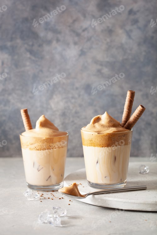 Preview: dalgona coffee in glass. trendy Instant coffee whipped with sugar and hot water