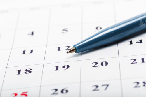 Preview: Check out the dates in a business calendar concept
