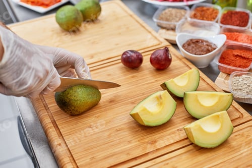 Preview: Fresh ingredients for salad or dip making: avocado, tomatoes,nuts,oil on rustic background, top view