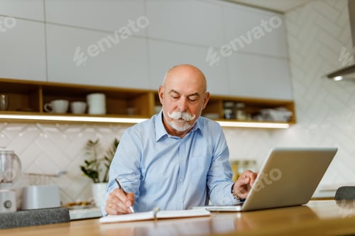 Preview: Sitting alone, kitchen in the background.