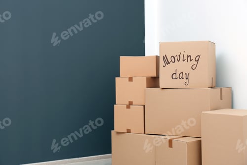 Preview: Pile of moving boxes in empty room