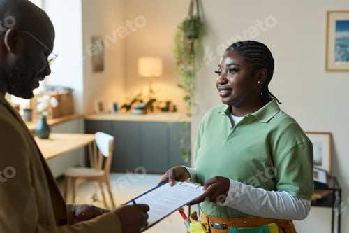 Preview: Man Signing Contract for Professional Cleaning Service